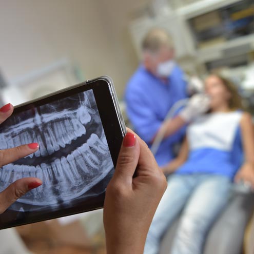 Dentist Office-Digital tablet with a patients x-rays
